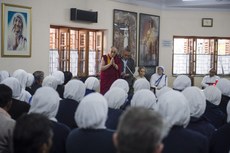 Dalai-Lama-speaking-to-the-sisters-at-Mother-Teresa's-House-in-Kolkata.jpg