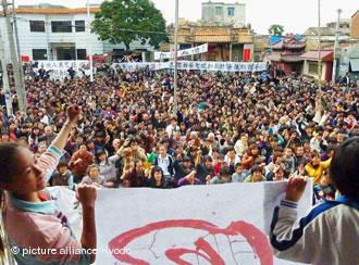 WUKAN, China - More than 1,000 residents protest corruption involving a local Communist leader during a rally in the village of Wukan in Lufeng, Guangdong Province, China, on Dec. 13, 2011. (Kyodo)