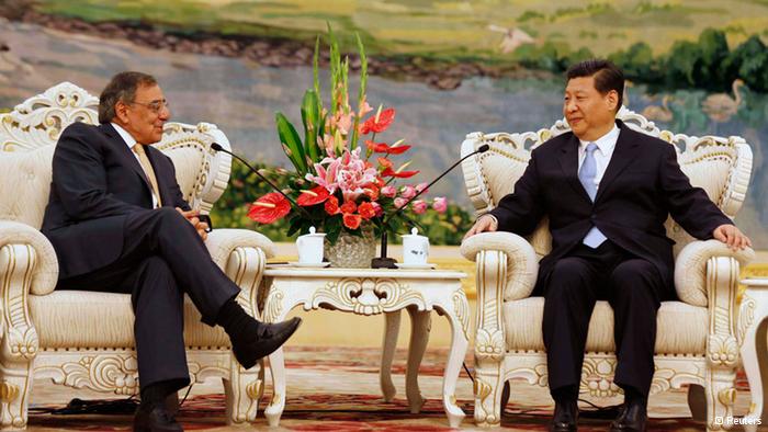 U.S. Secretary of Defense Leon Panetta (L) meets with China's Vice President Xi Jinping at the Great Hall of the People in Beijing September 19, 2012. Panetta is at the second official stop of his three-nation tour to Japan, China and New Zealand. REUTERS/Larry Downing (CHINA - Tags: POLITICS MILITARY)